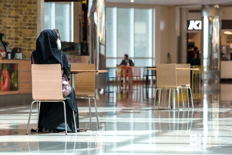 Abu Dhabi, United Arab Emirates, May 24, 2020.  
   Food court visitors practice social distancing at Mushrif Mall while getting a bite to eat.
Victor Besa  / The National
Section:  Standalone / Stock