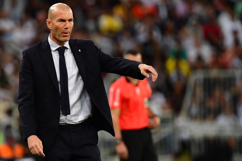 Real Madrid coach Zinedine Zidane gives orders during the match. AFP