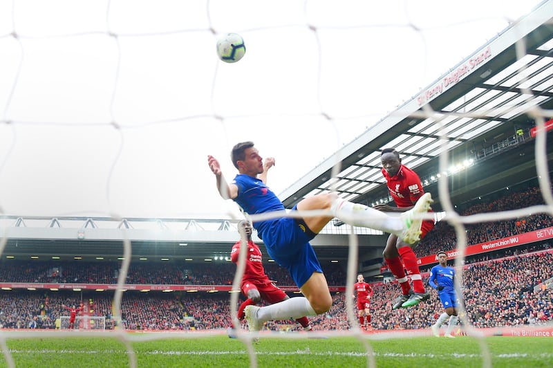 LIVERPOOL, ENGLAND - APRIL 14: Sadio Mane scores the first goal during the Premier League match between Liverpool FC and Chelsea FC at Anfield on April 14, 2019 in Liverpool, United Kingdom. (Photo by Michael Regan/Getty Images)