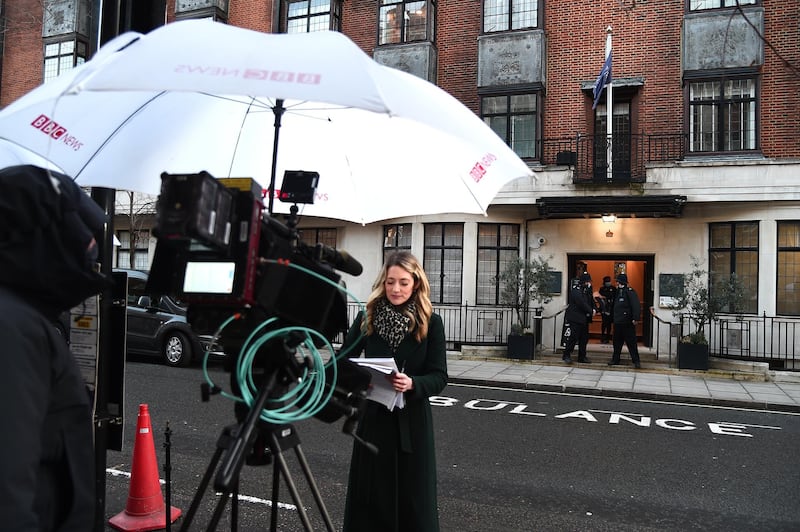 BBC news reporters are seen outside of The King Edward VII hospital. Getty Images