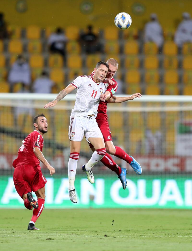 Caio Canedo of the UAE battles with Robert Melki of Lebanon at the Zabeel Stadium in Dubai. Chris Whiteoak / The National