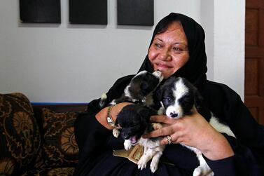 Amirah William is hopeful her 160 rescued dogs will get help from authorities. Jeffrey E Biteng/The National