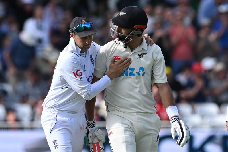 England's Joe Root congratulates New Zealand's Daryl Mitchell as he walks back to the pavilion, last man out on 190. AFP