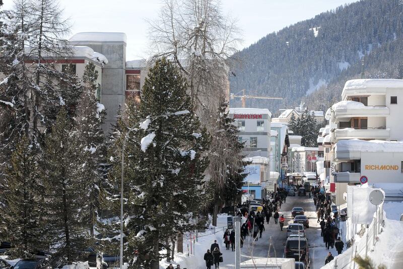 Automobiles travel along the promenade on day two of the World Economic Forum (WEF) in Davos, Switzerland, on Wednesday, Jan. 24, 2018. World leaders, influential executives, bankers and policy makers attend the 48th annual meeting of the World Economic Forum in Davos from Jan. 23 - 26. Photographer: Jason Alden/Bloomberg