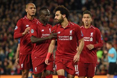 Sadio Mane, second left, and Mohamed Salah, second right, form one of the most dangerous attacks in Europe alongside Roberto Firmino, right. AFP