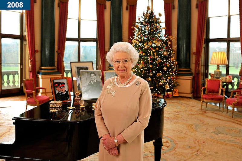 2008: The queen stands in the music room at Buckingham Palace after recording her Christmas day message to the Commonwealth.