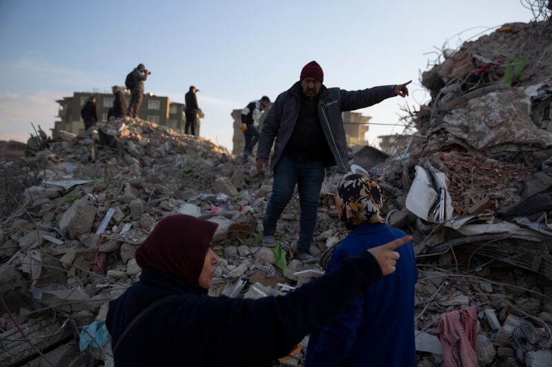 Collapsed buildings in Antakya, Turkey. AP