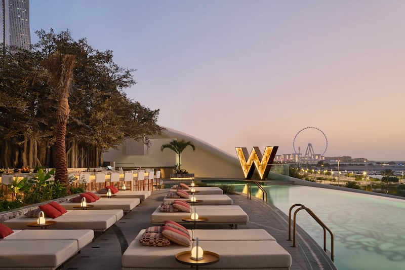 Sunset views and the famous W signage at Wet Deck. 