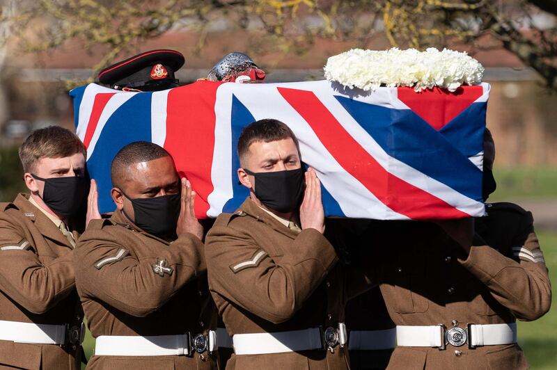 Soldiers from the British Army’s Yorkshire Regiment carry the coffin of Captain Tom Moore during his funeral service in Bedford, south-east England. AFP