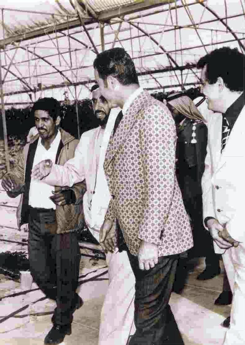 Sheikh Zayed toured the greenhouses with the director of the Arizona programme - with Abdullah Kaddas Al Romaithi (far left) as translator - and saw the results of the carefully designed project. Courtesy Ali Kaddas Al Romaithi