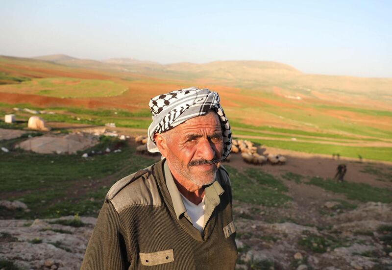 A Bedouin man pictured in Humsah al-Baqia, in the Israeli-occupied West Bank, with the area's fertile land in the background. AFP