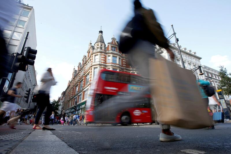 FILE PHOTO: Shoppers cross the road in Oxford Street, in London, Britain August 14, 2016.  REUTERS/Peter Nicholls/File Photo