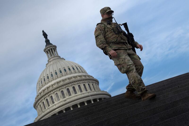 A member of the National Guard provides security at the US Capitol in Washington, DC. AFP