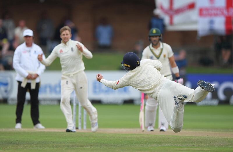Ollie Pope catches out  Rassie van der Dussen off the bowling of Joe Root. Getty