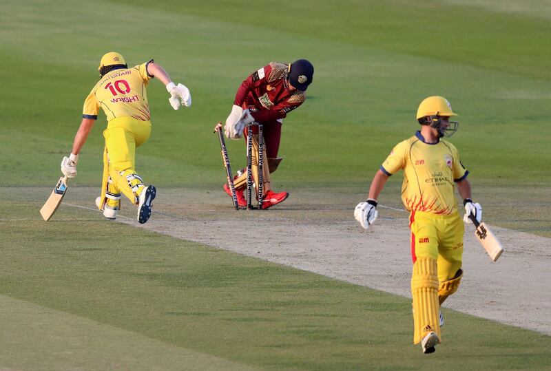 Abu Dhabi, United Arab Emirates - November 17, 2019: Abu Dhabi's Luke Wright is run out during the game between Team Abu Dhabi and The Northern Warriors in the Abu Dhabi T10 league. Sunday the 17th of November 2019. Zayed Cricket Stadium, Abu Dhabi. Chris Whiteoak / The National