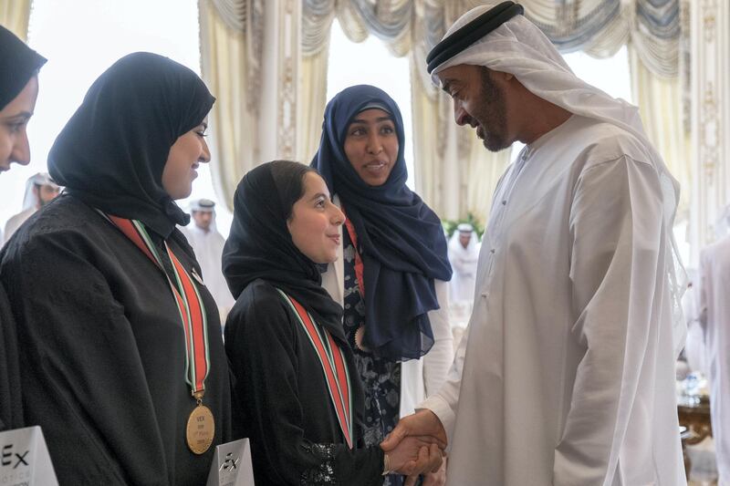 ABU DHABI, UNITED ARAB EMIRATES - June 24, 2019: HH Sheikh Mohamed bin Zayed Al Nahyan Crown Prince of Abu Dhabi Deputy Supreme Commander of the UAE Armed Forces (R), receives The UAE School students who won the second place in the World Championship of Artificial Intelligence and Robot Fix, which was held in Kentucky, USA, during a Sea Palace barza. 

( Rashed Al Mansoori / Ministry of Presidential Affairs )
---