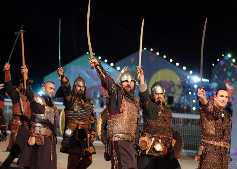Representatives of Hungary are led into the arena at the opening ceremony of the World Nomad Games. EPA