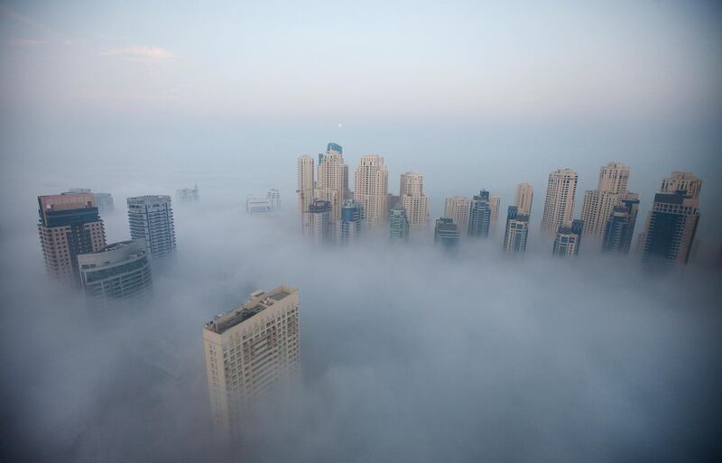 Dubai, January 28, 2013 -  Morning fog descends over Dubai Marina in Dubai, January 28, 2013. (Photo by: Sarah Dea/The National)