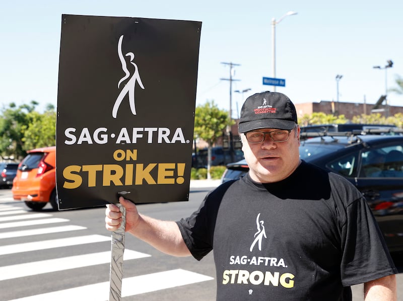 Sean Astin protests outside Paramount Studios in Los Angeles. AFP