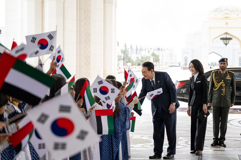 Mr Yoon greets schoolchildren
