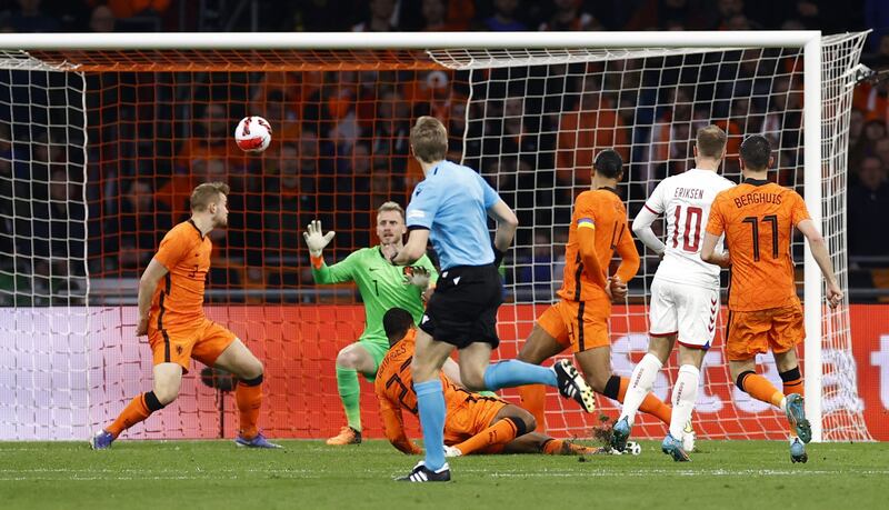 Christian Eriksen scores for Denmark against the Netherlands. AFP