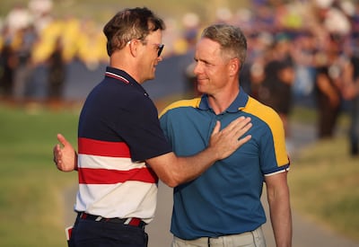 Luke Donald, right, shone as Team Europe captain, while USA skipper Zach Johnson struggled to get the best out of his players. Reuters