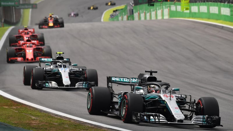Lewis Hamilton leads at the start of the race. AFP