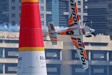 Juan Velarde of Spain manoeuvres his plane during a training session for the 2019 Red Bull Air Race World Championship in the Emirati capital Abu Dhabi on February 8,2019. / AFP / -