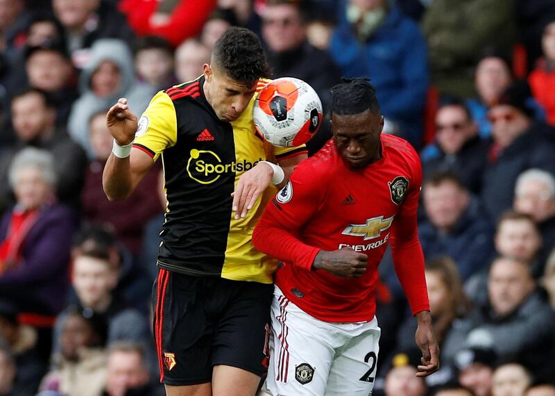 Watford's Adam Masina with Manchester United's Aaron Wan-Bissaka. Reuters