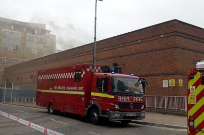 Smoke rises above buildings after a fire broke out at an electrical substation in Poplar, east London, on Tuesday. Photo: London Fire Brigade