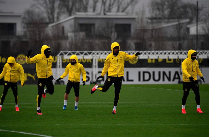 Dortmund's Thorgan Hazard, Manuel Akanji, Raphael Guerreiro, Dan-Axel Zagadou and Jadon Sancho warm up during a training session. AFP