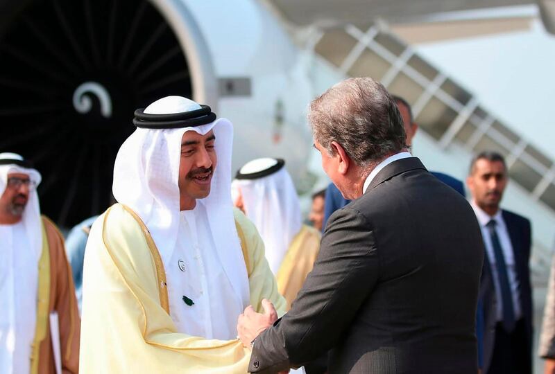 Pakistani Foreign Minister Shah Qureshi greets Sheikh Abdullah bin Zayed at Nur Khan military airbase in Islamabad.  AFP