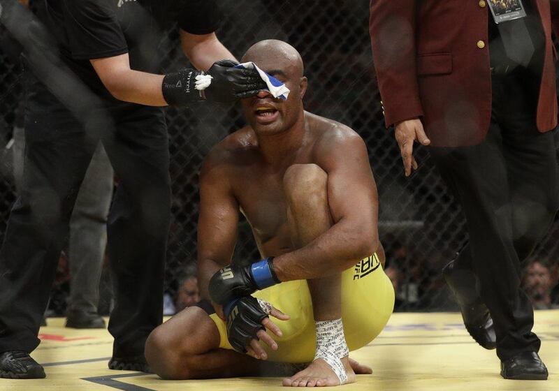 Anderson Silva gets his face wiped down after losing his light heavyweight bout against Daniel Cormier at UFC 200, Saturday, July 9, 2016, in Las Vegas. John Locher / AP Photo