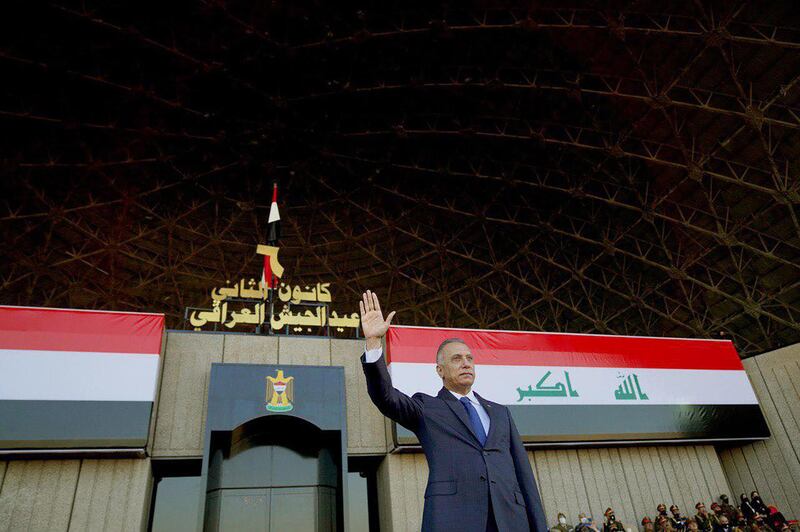 A handout picture released by Iraq's Prime Minister's Media Office on January 6, 2021, shows Prime Minister Mustafa al-Kadhemi gesturing in greeting during a ceremony to mark the 100th Army Day celebration in the capital Baghdad.  - === RESTRICTED TO EDITORIAL USE - MANDATORY CREDIT "AFP PHOTO / HO / IRAQI PRIME MINISTER'S PRESS OFFICE" - NO MARKETING NO ADVERTISING CAMPAIGNS - DISTRIBUTED AS A SERVICE TO CLIENTS ===
 / AFP / IRAQI PRIME MINISTER'S PRESS OFFICE / - / === RESTRICTED TO EDITORIAL USE - MANDATORY CREDIT "AFP PHOTO / HO / IRAQI PRIME MINISTER'S PRESS OFFICE" - NO MARKETING NO ADVERTISING CAMPAIGNS - DISTRIBUTED AS A SERVICE TO CLIENTS ===
