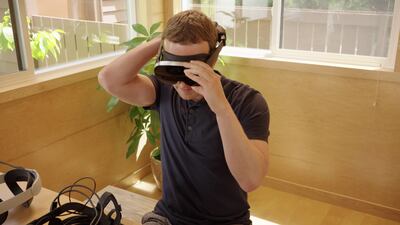 Mark Zuckerberg, founder and chief executive of Meta, trying an augmented reality headset. Photo: Meta