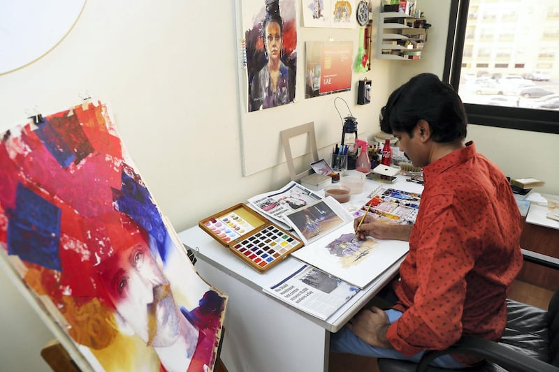 DUBAI , UNITED ARAB EMIRATES , May 14 – 2020 :- Artist Atul Panase making painting from the photo published in The National newspaper at his home studio in Deira Dubai. He is from India and based in Dubai for more than two decades. He was one of curators for World Art Dubai in 2017 and 2018. He is also the UAE Country Leader since last 5 years for the team of watercolorists for FabrianoInAcquarello and UrbinoInAcquerello international watercolor festivals which happen annually in Italy. He started the art activity  #pickanypicandpaint from the newspaper during the stay home era in the UAE because of COVID 19 pandemic. In this art activity which is trending with the hash tag #pickanypicandpaint involves more than 80 artists locally and internationally so far as the number is growing day by day. People here and also from other countries are participating and painting from the piece of newspapers. (Pawan Singh / The National) For Arts & Life/Online/Instagram.  Story by Katy Gillett