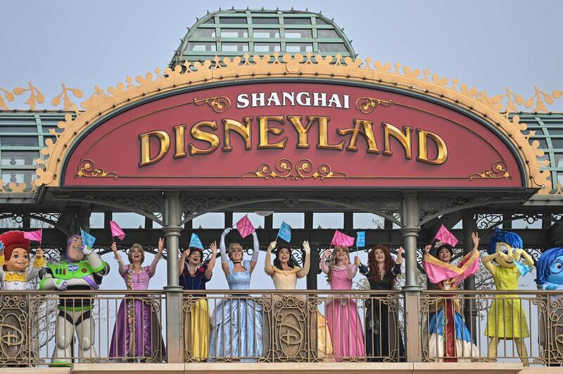 Performers at Shanghai Disneyland dressed as Disney characters. AFP