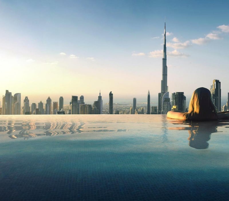 The Downtown Dubai and Burj Khalifa view from the rooftop pool at newly opened SLS Dubai, which is offering couples a 'spa-cation' deal. SLS Hotels