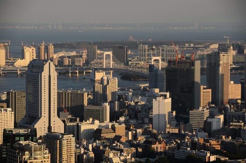 Commercial and residential buildings stand in the Minato district of Tokyo, Japan, on Friday, Sept. 29, 2017. Confidence among Japan’s big manufacturers has improved to the highest level in a decade, according to the quarterly Tankan survey released by the Bank of Japan on Monday. Photographer: Akio Kon/Bloomberg