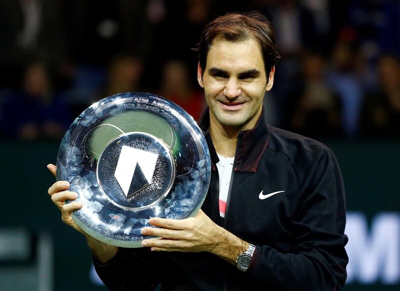 Tennis - ATP 500 - Rotterdam Open - Final - Ahoy, Rotterdam, Netherlands - February 18, 2018 - Roger Federer of Switzerland holds the trophy after winning against Grigor Dimitrov of Bulgaria. REUTERS/Michael Kooren