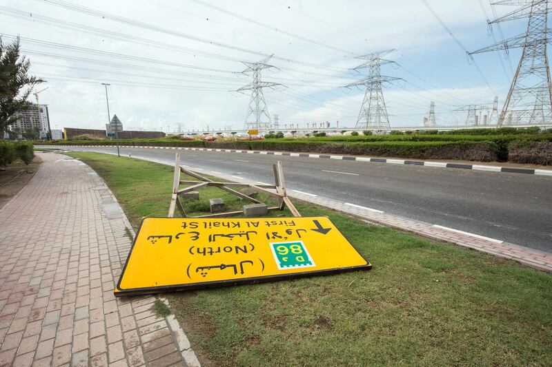 Dubai, United Arab Emirates - A signage downed by the strong wind at Ibn Batuta area.  Ruel Pableo foir The National