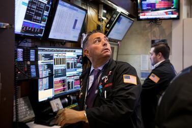 A trader works on the floor of the New York Stock Exchange. US stocks and commodities tumbled after China retaliated with higher tariffs on a range of American goods. Bloomberg