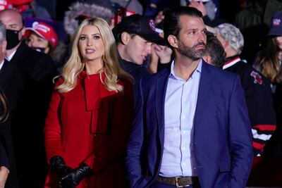 Ivanka Trump and Donald Trump Jr listen as father Donald Trump speaks during a campaign rally on November 2, 2020. AP