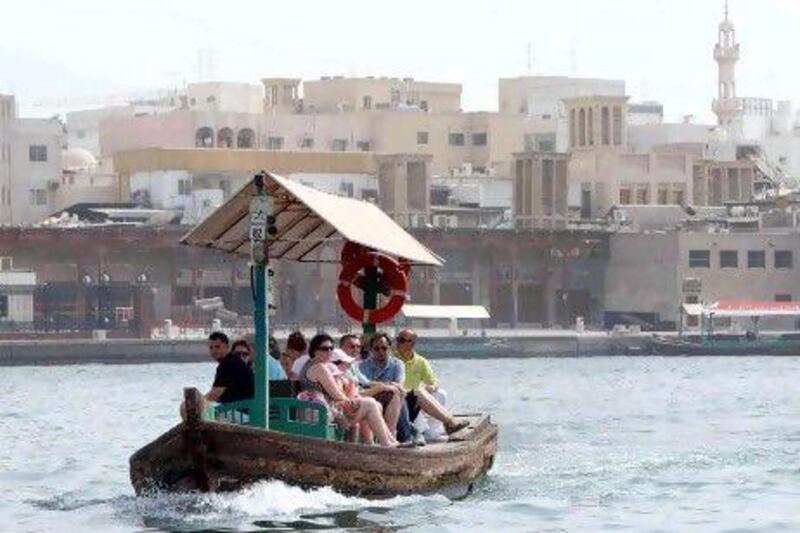 Unrest in some parts of the region has diverted many tourists towards the UAE. Above, Dubai Creek. Stephen Lock / The National