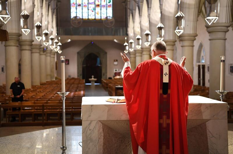 Brisbane's Catholic Archbishop Mark Coleridge delivers a Good Friday mass to an empty St Stephen's cathedral in Brisbane. EPA
