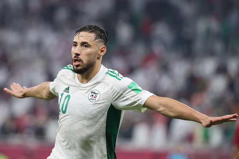 Algeria's forward Youcef Belaili celebrates after scoring the second goal during the Fifa Arab Cup 2021 semi-final win against Qatar in Doha on December 15, 2021. AFP
