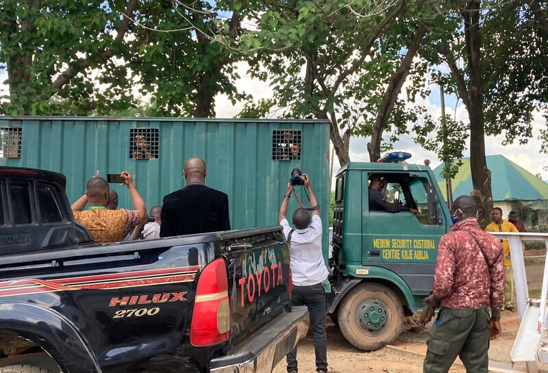 Recaptured inmates being taken back to Kuje maximum security prison. AP