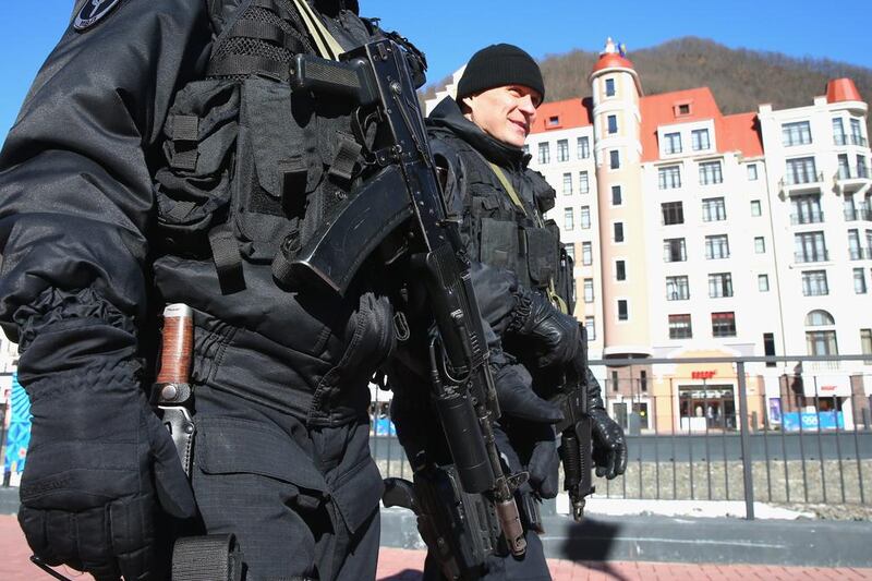 Police security patrol around the Rosa Khutor Mountain Cluster village ahead of the Sochi 2014 Winter Olympics. Alexander Hassenstein / Getty Images