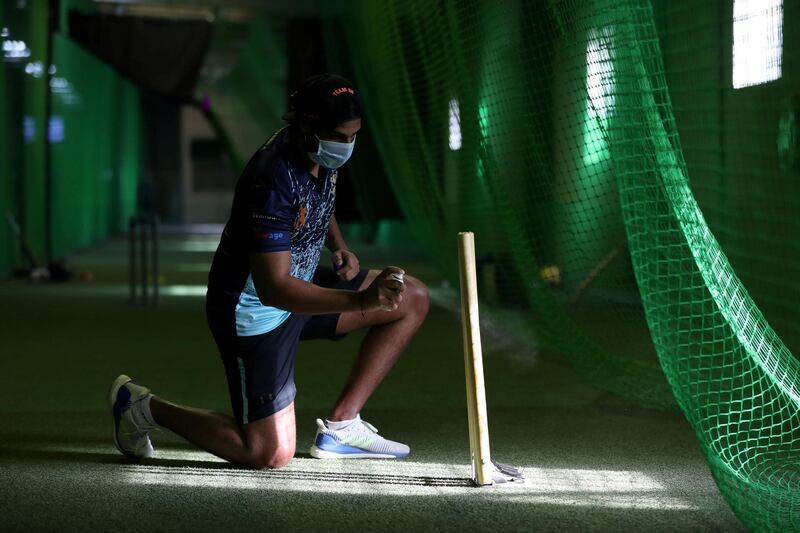 Dubai, United Arab Emirates - Reporter: N/A. News. Coronavirus/Covid-19. Covid safety measures take place as OB of Front foot sports cricket academy disinfects the stumps at United pro sports in Al Quoz. Saturday, October 17th, 2020. Dubai. Chris Whiteoak / The National