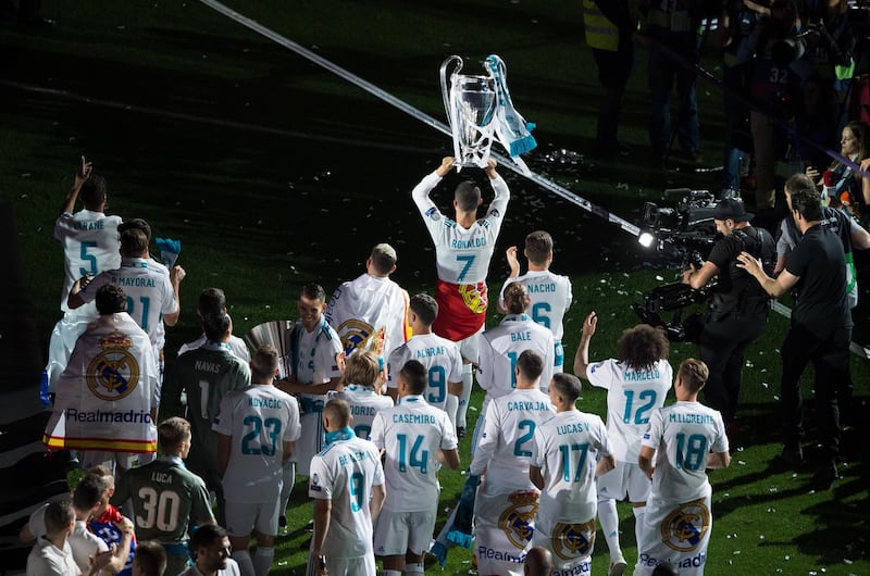 Cristiano Ronaldo celebrates with teammates while Real Madrid celebrate their Champions League Final win at Santiago Bernabeu, Madrid, Spain. May 27, 2018. Denis Doyle / Getty Images